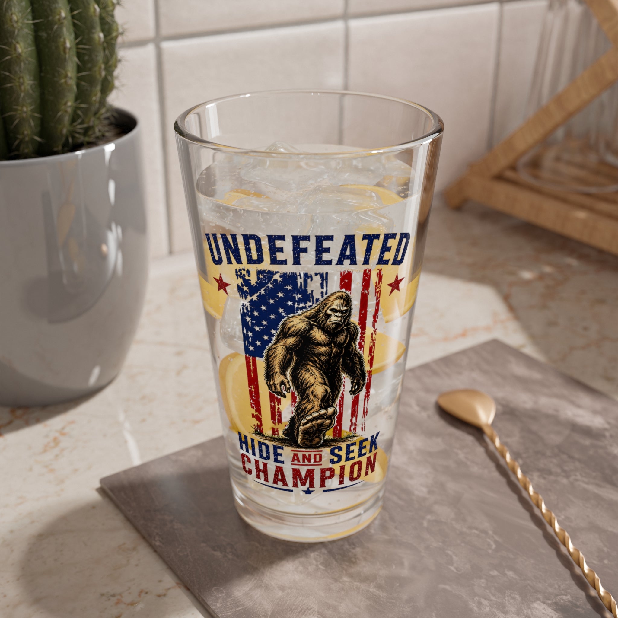 "Undefeated Hide and Seek Champion" Bigfoot Pint Glass — Mixing Glass